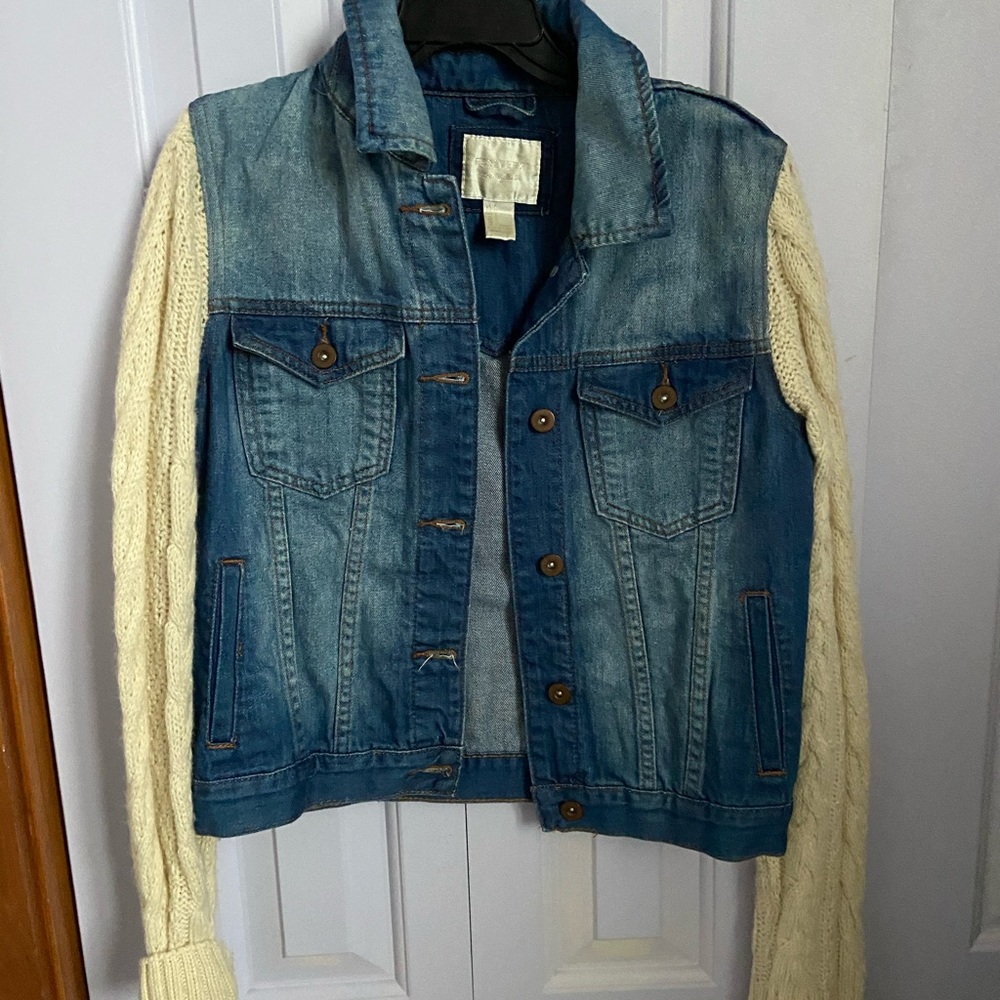 Denim jacket with sweater sleeve
